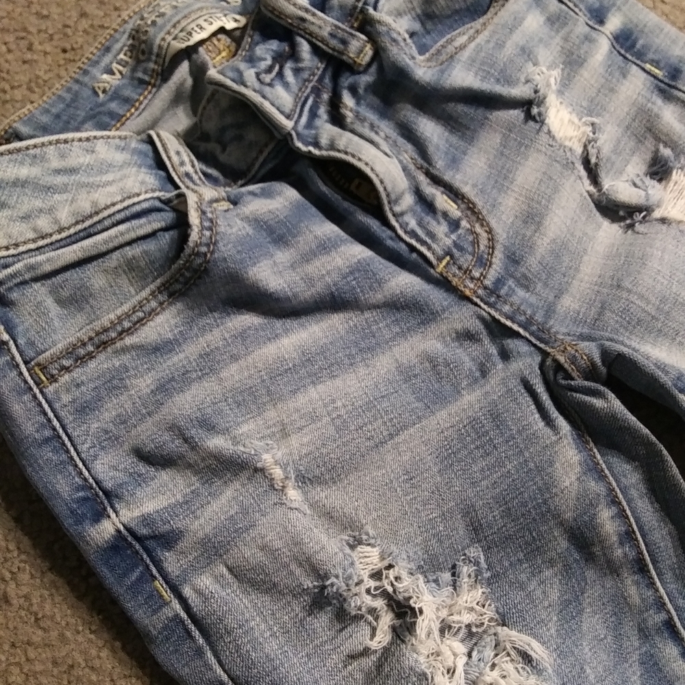 AE straight legged destroyed jeans